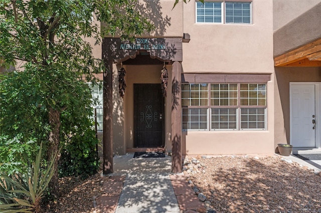 7206 Avenida El Nido, Santa Fe, NM 87507 - property entrance featuring stucco siding