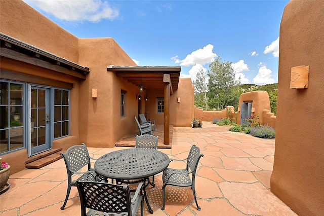 95 Lodge Trl, Santa Fe, NM 87506 - view of patio with outdoor dining space