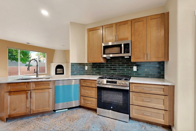 5 Wood Flower, Santa Fe, NM 87508 - kitchen featuring appliances with stainless steel finishes, tasteful backsplash, light countertops, and light brown cabinets