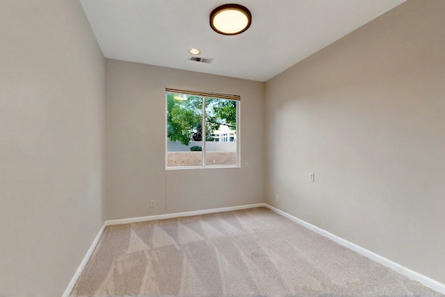 5 Wood Flower, Santa Fe, NM 87508 - empty room featuring baseboards and light carpet