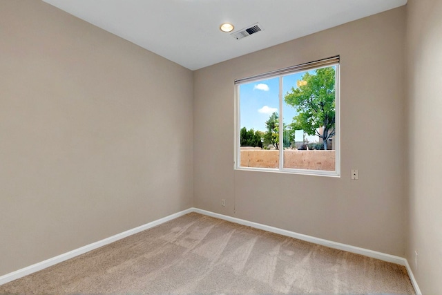5 Wood Flower, Santa Fe, NM 87508 - empty room with light colored carpet and baseboards