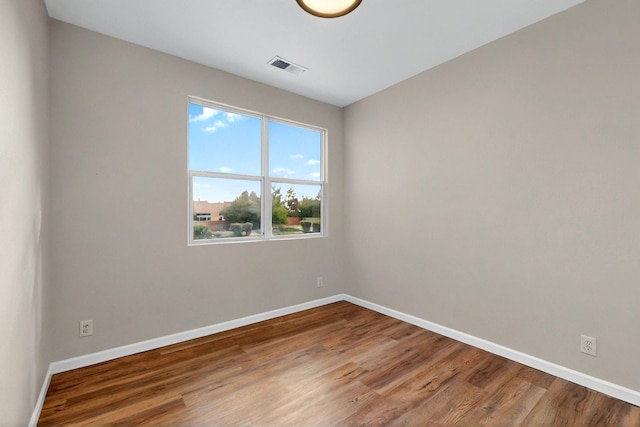 5 Wood Flower, Santa Fe, NM 87508 - spare room featuring wood finished floors and baseboards