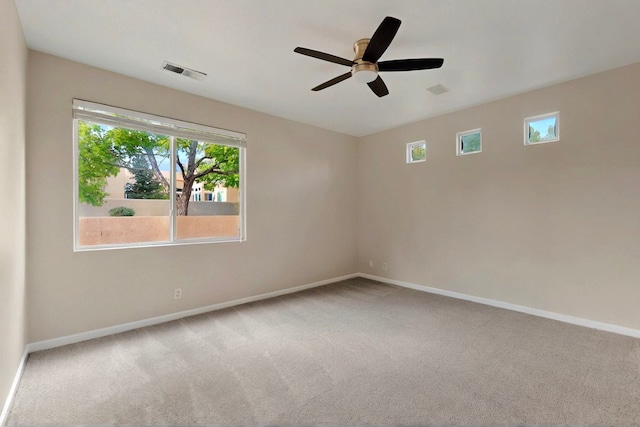 5 Wood Flower, Santa Fe, NM 87508 - carpeted spare room with baseboards and ceiling fan