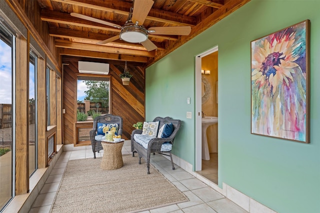 3046 Plaza Blanca, Santa Fe, NM 87507 - sunroom / solarium with a wooden ceiling with exposed beams, tile patterned floors, wooden walls, and a wall mounted air conditioner