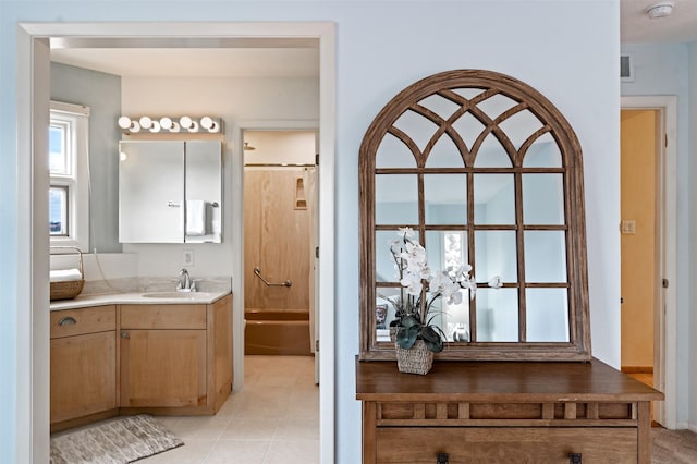3046 Plaza Blanca, Santa Fe, NM 87507 - full bath with vanity, washtub / shower combination, and tile patterned floors