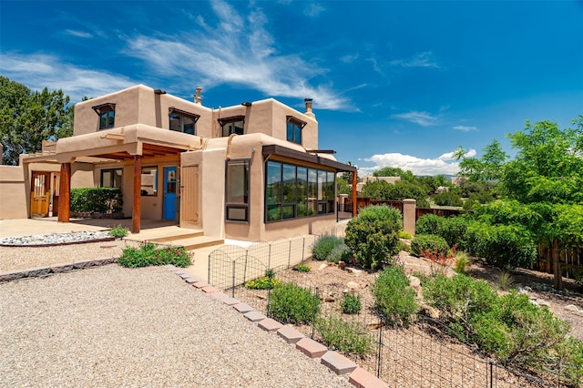 3046 Plaza Blanca, Santa Fe, NM 87507 - view of front facade featuring stucco siding