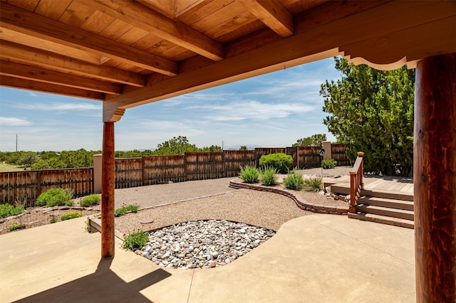 3046 Plaza Blanca, Santa Fe, NM 87507 - fenced backyard featuring a patio