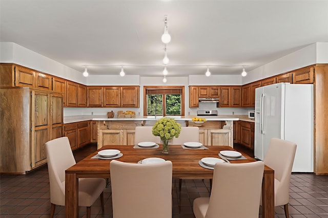 320 Valle Del Sol, White Rock, NM 87547 - dining space with track lighting and dark tile patterned flooring
