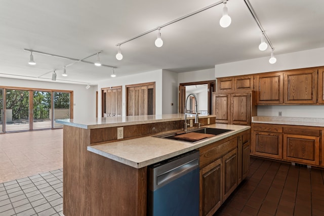 320 Valle Del Sol, White Rock, NM 87547 - kitchen featuring dishwasher, rail lighting, light countertops, and an island with sink