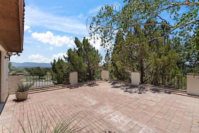 320 Valle Del Sol, White Rock, NM 87547 - view of patio / terrace with a mountain view