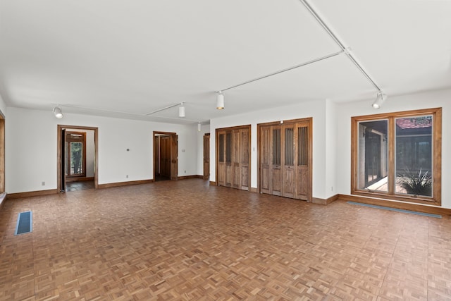 320 Valle Del Sol, White Rock, NM 87547 - spare room with track lighting and baseboards