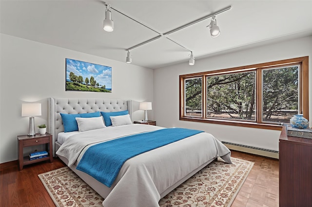 320 Valle Del Sol, White Rock, NM 87547 - bedroom featuring baseboard heating and track lighting