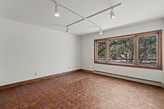 320 Valle Del Sol, White Rock, NM 87547 - spare room with rail lighting and baseboard heating