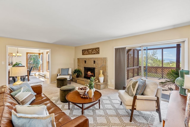620 Navajo, Los Alamos, NM 87544 - carpeted living room featuring healthy amount of natural light, a chandelier, and a stone fireplace