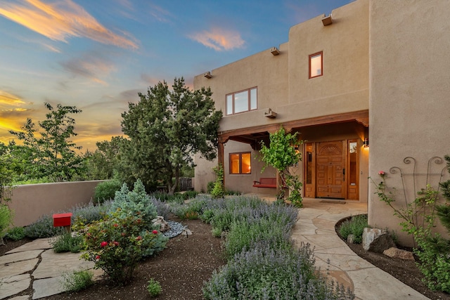 19 Camino Don Carlos, Santa Fe, NM 87506 - view of front of house with stucco siding