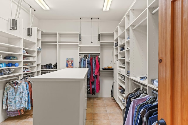 19 Camino Don Carlos, Santa Fe, NM 87506 - walk in closet featuring light tile patterned floors