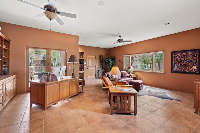 19 Camino Don Carlos, Santa Fe, NM 87506 - living room featuring ceiling fan, plenty of natural light, and light tile patterned flooring