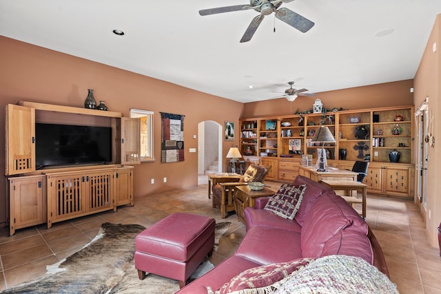 19 Camino Don Carlos, Santa Fe, NM 87506 - tiled living area featuring ceiling fan and arched walkways