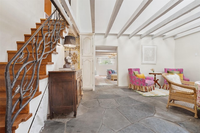 46 Sibley, Santa Fe, NM 87508 - sitting room with beamed ceiling, stairway, and stone finish flooring