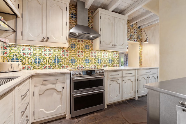 46 Sibley, Santa Fe, NM 87508 - kitchen featuring wall chimney range hood, double oven range, beamed ceiling, decorative backsplash, and light countertops