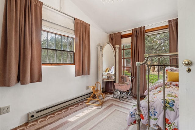 46 Sibley, Santa Fe, NM 87508 - bedroom featuring baseboard heating and vaulted ceiling