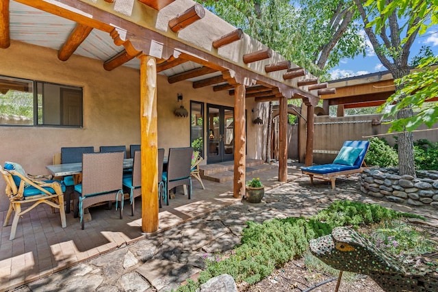 234 Ambrosio Unit A, Santa Fe, NM 87501 - view of patio / terrace with french doors and outdoor dining area