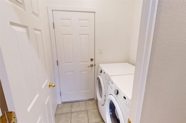 310 Grand Cyn, White Rock, NM 87547 - laundry area with washer and clothes dryer and light tile patterned flooring