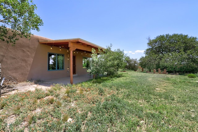 10 Carlito Rd, Santa Fe, NM 87508 - view of green lawn featuring a patio area
