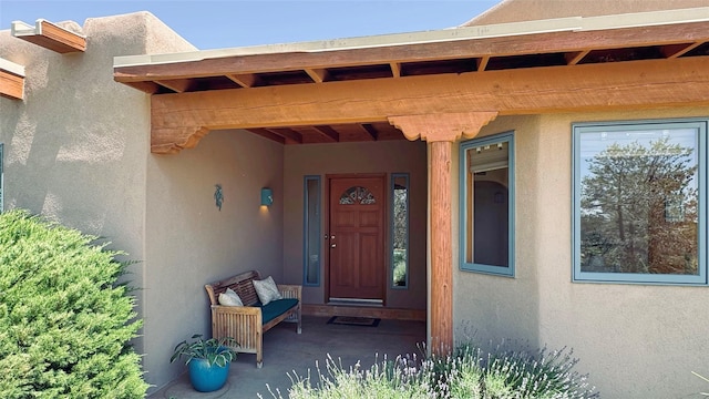 10 Carlito Rd, Santa Fe, NM 87508 - property entrance featuring stucco siding