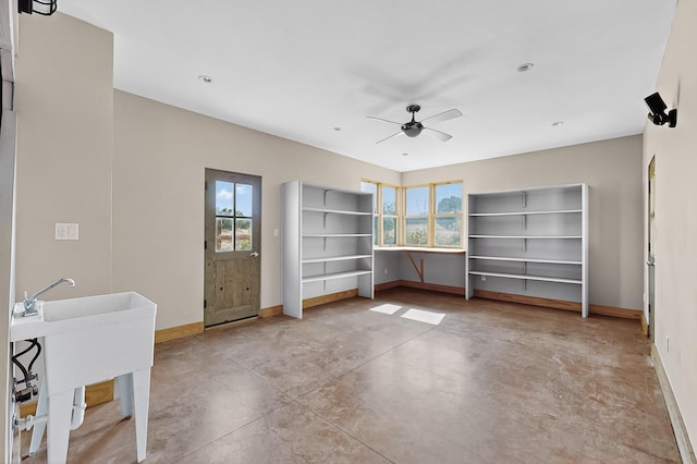 37 Camino Tetzcoco, Santa Fe, NM 87508 - unfurnished room featuring finished concrete floors and ceiling fan