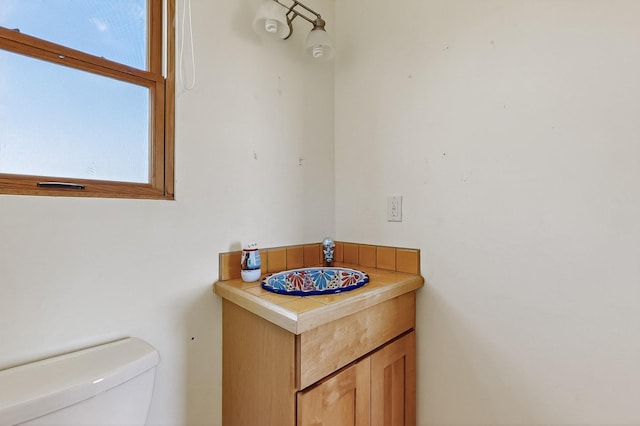 37 Camino Tetzcoco, Santa Fe, NM 87508 - bathroom featuring a sink and toilet