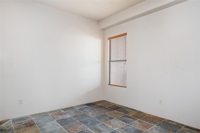 1405 Vegas Verdes Unit 136, Santa Fe, NM 87507 - empty room with stone tile floors