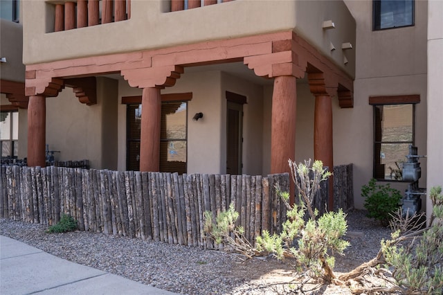 1405 Vegas Verdes Unit 136, Santa Fe, NM 87507 - doorway to property with stucco siding