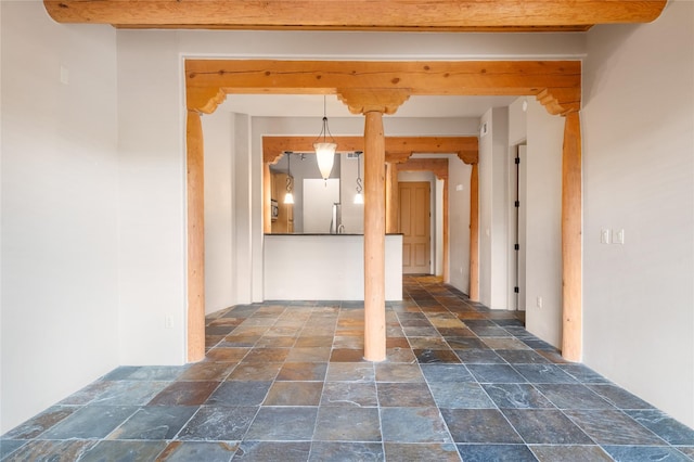 1405 Vegas Verdes Unit 136, Santa Fe, NM 87507 - corridor featuring stone tile floors
