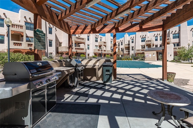 1405 Vegas Verdes Unit 136, Santa Fe, NM 87507 - view of patio / terrace with area for grilling and a pergola