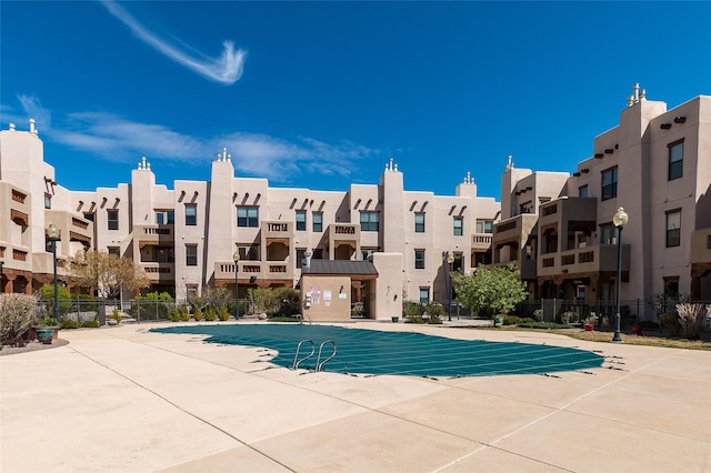 1405 Vegas Verdes Unit 136, Santa Fe, NM 87507 - view of swimming pool with a residential view
