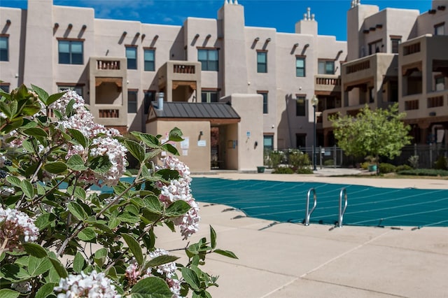 1405 Vegas Verdes Unit 136, Santa Fe, NM 87507 - view of pool featuring a residential view