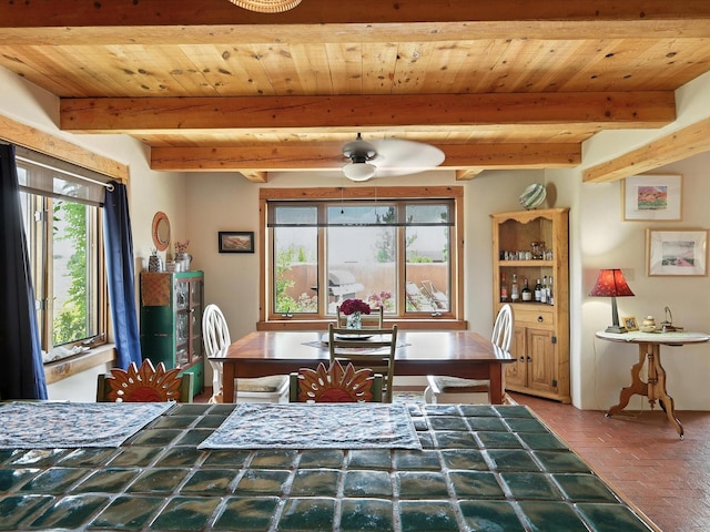 62 Camerada Loop, Santa Fe, NM 87508 - dining space featuring brick patterned floors and a wood ceiling with exposed beams