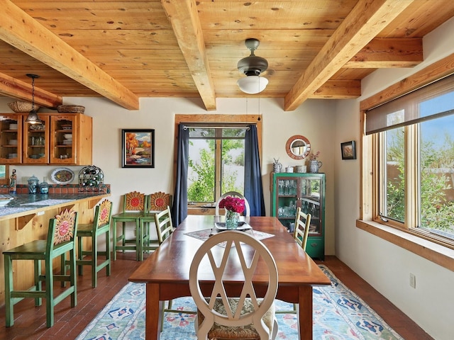 62 Camerada Loop, Santa Fe, NM 87508 - dining space featuring a wooden ceiling with exposed beams and wood finished floors