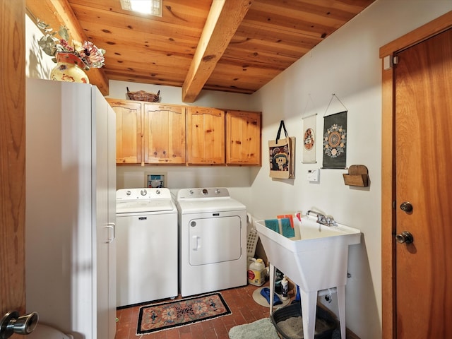 62 Camerada Loop, Santa Fe, NM 87508 - laundry area with brick flooring, cabinet space, independent washer and dryer, and wooden ceiling