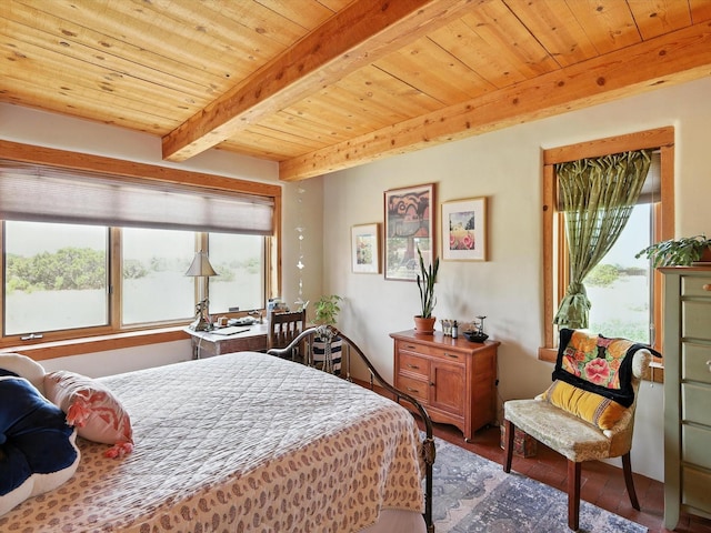 62 Camerada Loop, Santa Fe, NM 87508 - bedroom with a wooden ceiling with exposed beams and wood finished floors