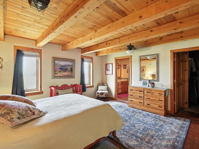 62 Camerada Loop, Santa Fe, NM 87508 - bedroom with multiple windows, a wood ceiling with exposed beams, brick patterned floors, and connected bathroom