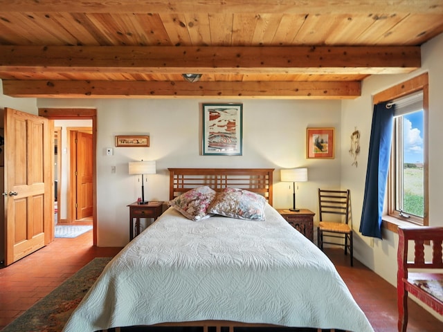 62 Camerada Loop, Santa Fe, NM 87508 - bedroom featuring a wooden ceiling with exposed beams
