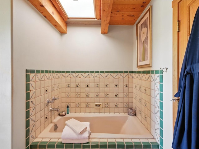 62 Camerada Loop, Santa Fe, NM 87508 - bathroom featuring a bath and a wooden ceiling with exposed beams