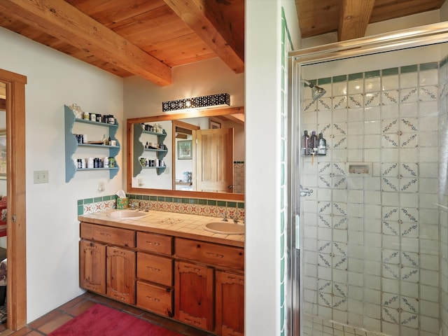 62 Camerada Loop, Santa Fe, NM 87508 - full bathroom with decorative backsplash, tile patterned flooring, a shower stall, double vanity, and a wood ceiling with exposed beams