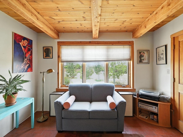 62 Camerada Loop, Santa Fe, NM 87508 - sitting room with a wooden ceiling with exposed beams and brick patterned flooring
