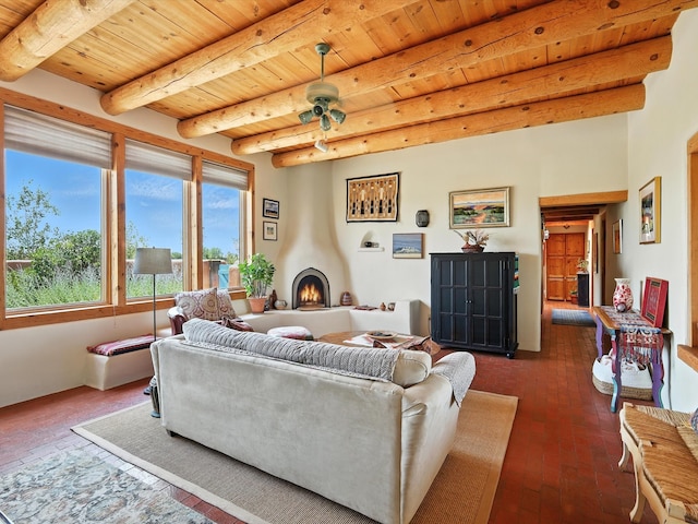 62 Camerada Loop, Santa Fe, NM 87508 - living area with brick floors and a wooden ceiling with exposed beams