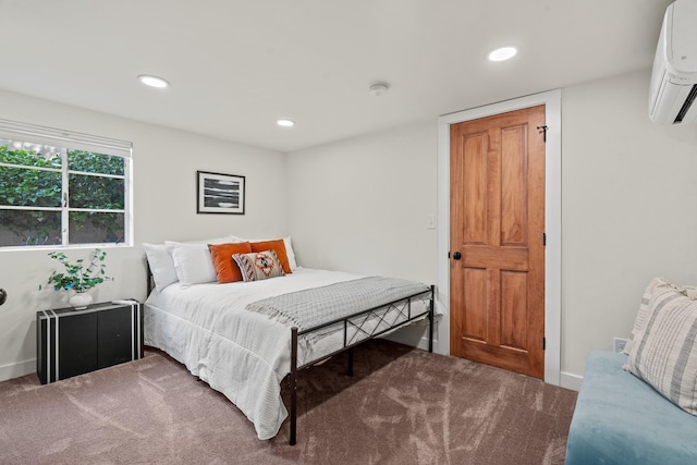 610 Rio Grande Ave, Santa Fe, NM 87501 - carpeted bedroom with a wall mounted air conditioner and recessed lighting