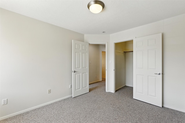 4857 Yucca St, Los Alamos, NM 87544 - unfurnished bedroom with light carpet and a closet