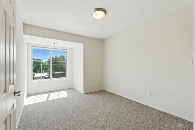 4857 Yucca St, Los Alamos, NM 87544 - carpeted spare room featuring baseboards